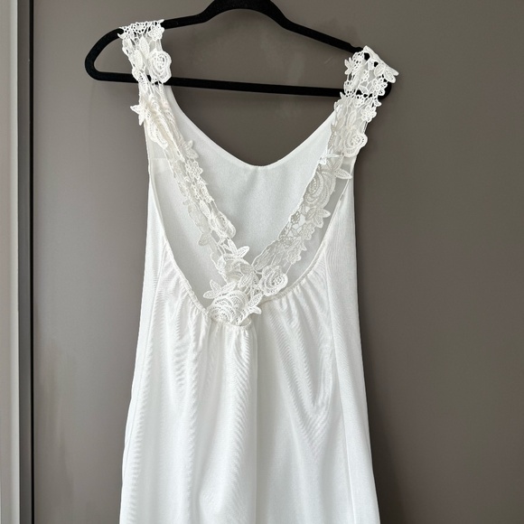 Lace Cross-Back White Mini-Dress with Slight Plunge Top - Picture 1 of 5